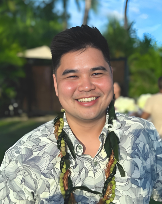 Sean Awakuni, MD, QME, in a casual setting. Contact Sean Awakuni for expert psychiatric evaluations and medical-legal assessments.